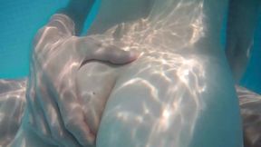 Indulge in aquatic hedonism as buxom beauties frolic naked in a sun-kissed garden oasis