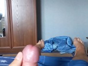 Young gay caresses his feet and cums on them