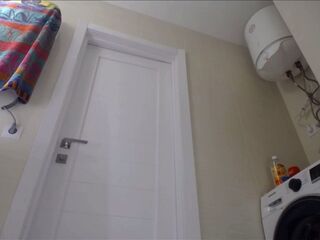 Fingering taut vagina in pink suit