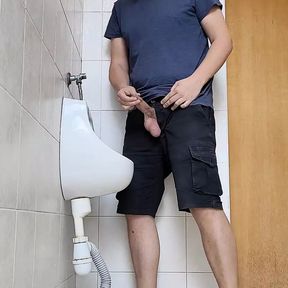 Risky wank in public urinal