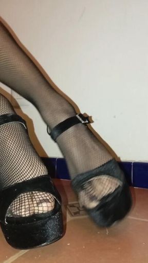 Just showing off my heels and fishnets