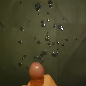 An explosive slow motion POV cumshot from a great reacharound handjob