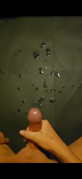 An explosive slow motion POV cumshot from a great reacharound handjob