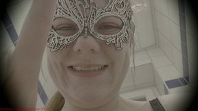 Shrunken and glued onto a sheet of toilet paper