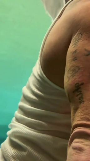 Amazon Kandy Flexes Her Massive Biceps in Her Hotel Pool