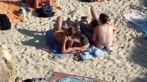 4 Guys Playing On Nude Beach