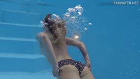 ”Charming blonde Finnish pornstar Mimi Cica underwater”