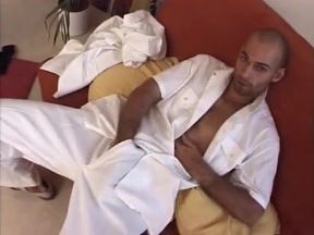 Athletic dude jerking his dick