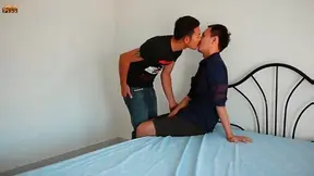 Two Asian dudes suck each others dick in a bedroom