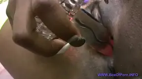 Hot ebony pornstar Shae Spreadz masturbates with glass dildo