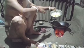 I was cooking naked when my husband came over and started squeezing my breasts.