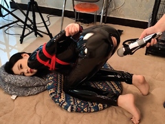 Chinese bondage with shiny black outfit and vibrator