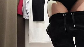 Sexy brown-haired in fitting room reveals big tits and hairy pussy