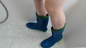 Rubberboots in bathtube
