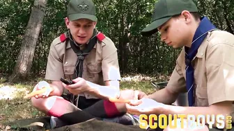 Two twink scouts in uniform fuck bareback by campfire outdoors