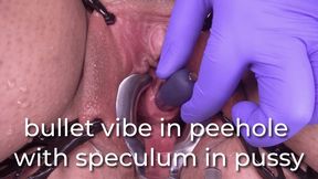 bullet vibe in peehole with speculum in pussy - uncaptioned