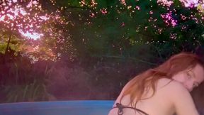 Wet and horny redhead shows off in a hot tub