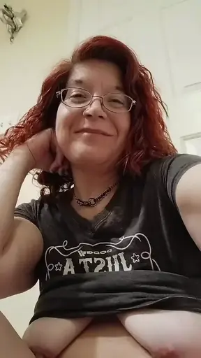 Curvy MILF in homemade POV video showing off her natural tits