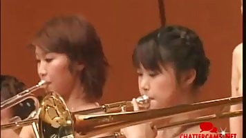 Naked Japanese ladies are professional musicians and like to perform as often as it is possible