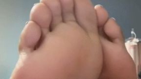 Moonette's showing off her sexy size 9 sweaty soles and pretty wiggling toes on her work desk! Clip 1