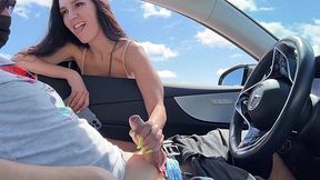 A brunette slut blows a stranger's boner in an empty parking lot