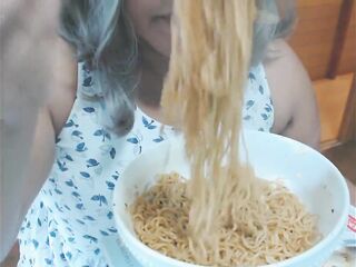 Cute feedee eats noodles for her feeder