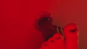 Lubed up footjob on the wall