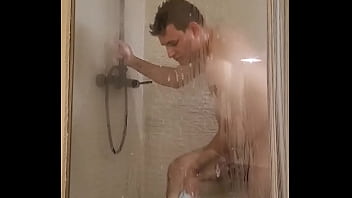 Twink caught showering with boner