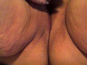 Obese and horny BBW wife diddles her puffy cunt with dildo