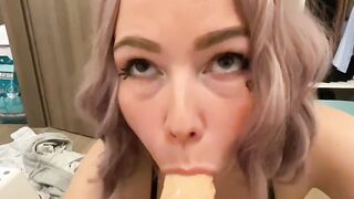 Big Titted Bitch plays with milk while blowing Vibrator Penis