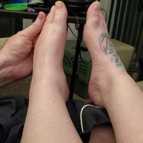 Husband rubbing my lotion on my feet