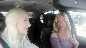 ”Teen & MILF Team up for Scissoring Session in Car!”