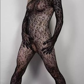 Sexy Blonde Crossdresser in Bodystocking with Butt Plug