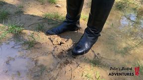Louboutin boots in the muddy puddles