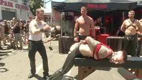 Bound Hunk Publicly Tormented And Gang Fucked For His First Dore Alley