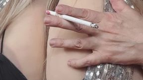 CupKCindy I am lying on my back in a silver skirt short I am rubbing my pussy spread in my legs you should see my hairy pussy I'm smoking a cigarette how nasty masturbating smoking