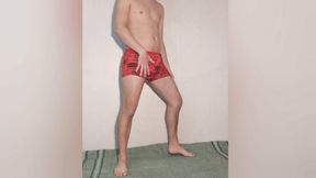 Sexy Russian guy posing in red panties and getting naked