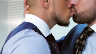 Men in suits enjoy a rough session of steamy sex at work