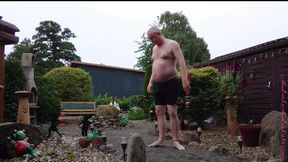Fat man in the front yard 1, swimming trunks