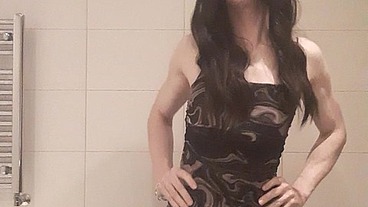 Sexy femboy in tights and dress playing with dildo