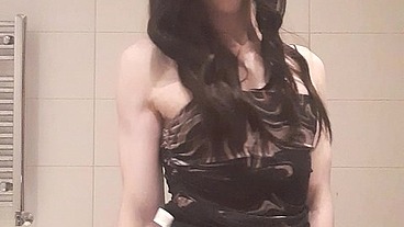 Sexy femboy in tights and dress playing with dildo