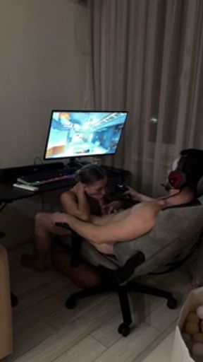 She sucked him off while he was playing his favorite video game