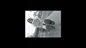 Nurse vicki models in her black and whot hogwarts outfit and spiked boots