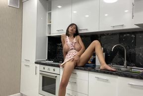 Stunning Busty Bitch Masturbates in the Kitchen Before Her Lover Arrives