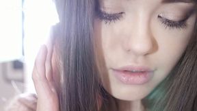 Sweet looking babe Li Moon is fucking herself early in the morning