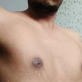 Indian boy taking bath