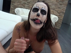 She's sucking dick with halloween face paint
