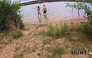 Hunt4k. he spotted the couple at a nudist beach and joined them