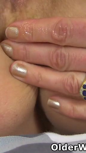 English MILF Dolly Toys Her Pussy and Fingers Her Arse