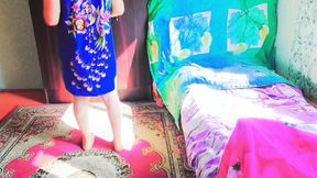 Playful Trans Beauty Showing Bare Shoulders in Candlelight